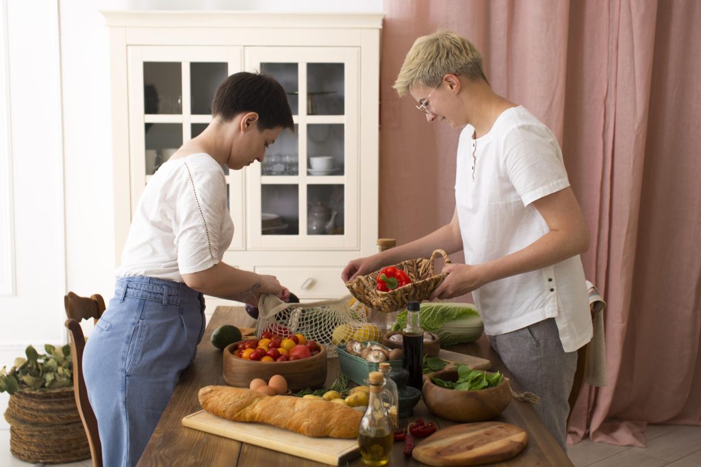 NDIS Participant preparing Meal in supported independent living accommodations
